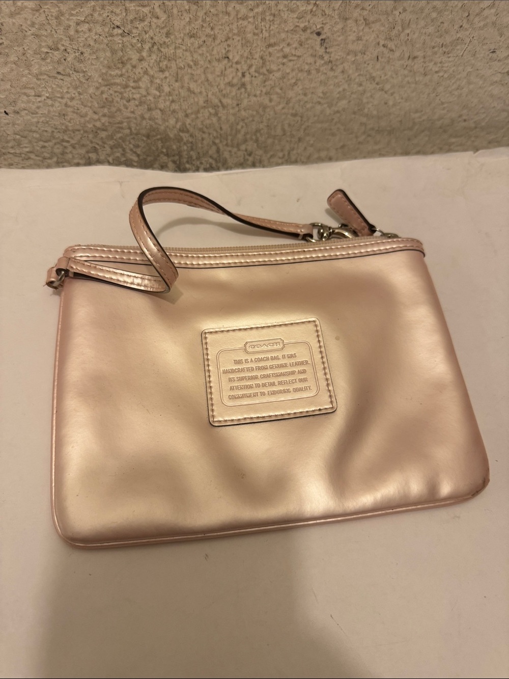 Coach Metallic Rose Gold Wristlet Clutch